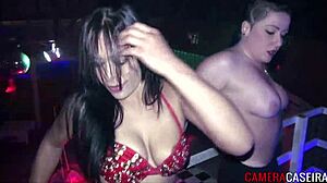 watch these hot brazilian brunettes strip naked and tease in the club!