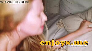 Busty blonde shaves pussy smooth for deepthroat blowjob and titty fuck on huge cock