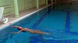 Hungarian milf teasing her big ass and tits naked in pool?