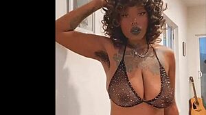 ebony babe slowly teases her big tits in sexy lingerie