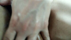 A hot babe delivers oiled handjob with intense pussy rub in hd glory