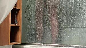 bbw gets caught stroking her fat pussy in the steamy shower