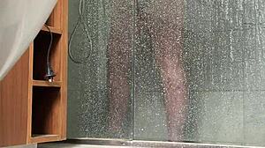 bbw gets caught stroking her fat pussy in the steamy shower