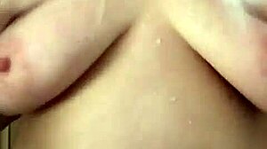 Big Boob Mama Showers, Washes Hair and Shaves Pussy