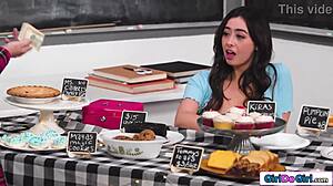 stepmom sneaks under table to lick stepdaughter's pussy wet