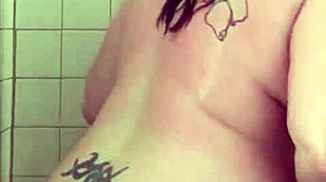 Big Boob Mama Showers, Washes Hair and Shaves Pussy