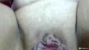 Watch my purple-haired mature BBW wife gap her fat pussy with dildo on webcam for clients.