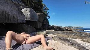 Curvy beach nudist flashes hairy beaver up close?