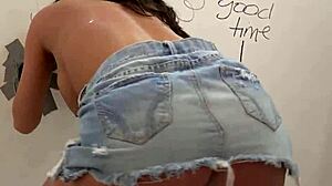 How does this busty slut handle that massive bbc in her gloryhole suck session?