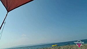 nippleringlover bares shaved pierced pussy with huge rings on windy beach