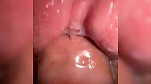 close-up on juicy cum-filled pussy getting fucked hard