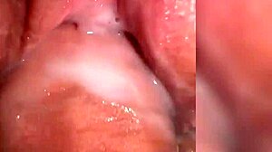 close-up on juicy cum-filled pussy getting fucked hard