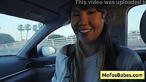 sexy asian teen tomie tang teases her huge natural boobs in the car for charles dera