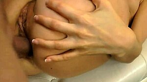 Sabrina strums her favorite instrument with teasing rhythm