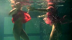 Lilia Mihalkova and Natalia Kupalka dive underwater for tight pussy play... oops wet!!