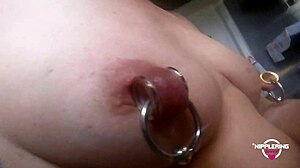 Nippleringlover's Extreme Pierced Nipples Thrill Kinky Mom Close-Up