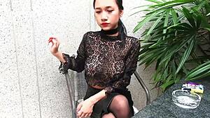 young teen goddess in leather skirt smokes topless outdoors pov