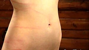 lesbian slave bound in handcuffs whipped by mistress