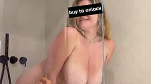 chubby girl in shower plays coy with her toy