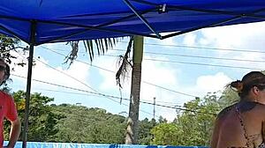 wife flashes big ass in tight body by pool as husband ignores