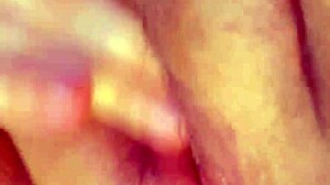 curvy latina fingers fat wet pussy lips and rubs huge clit up close