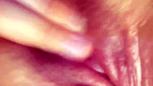 curvy latina fingers fat wet pussy lips and rubs huge clit up close