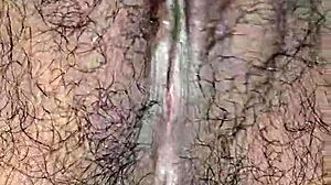 desi housewife's juicy hairy pussy lips up close while she moans and masturbates wet?