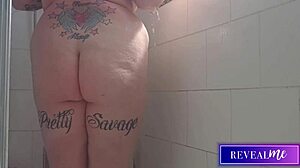 Curvy babe fingers her wet pussy in steamy shower jet play