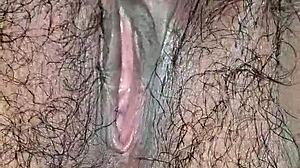 desi housewife's juicy hairy pussy lips up close while she moans and masturbates wet?