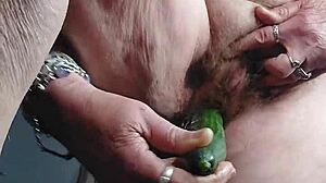 hey oma stuffs cucumber deep in her hairy german granny beaver