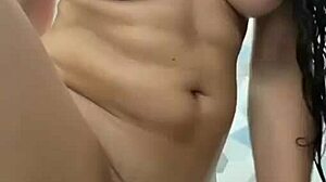 latina prostitute toys her wet pussy and ass while showering seductively