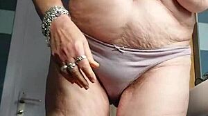 hey oma stuffs cucumber deep in her hairy german granny beaver