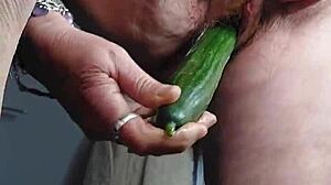 hey oma stuffs cucumber deep in her hairy german granny beaver