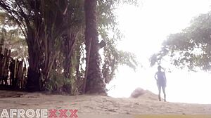 black beauty teases seductively on sunny beach with ebony curves