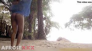 black beauty teases seductively on sunny beach with ebony curves