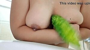 oh man these huge oiled boobs crush that cucumber so juicy 🍆💦