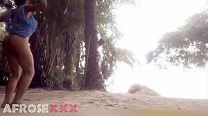 black beauty teases seductively on sunny beach with ebony curves