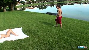 topless busty brunette sunbather gets big cock surprise outdoor fuck