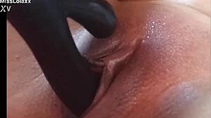 sensual latina babe teases her wet pussy with dildo on bed