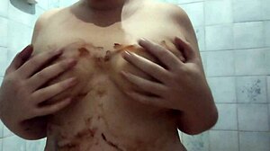 chubby babe masturbates belly pussy with chocolate finish