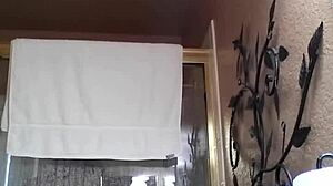 Amateur Asian babe fingers wet pussy hard in steamy shower bath