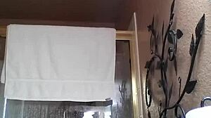 Amateur Asian babe fingers wet pussy hard in steamy shower bath