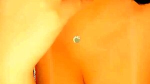 this hot brunette goddess teases her huge tits with titty fuck then plugs that extreme ass