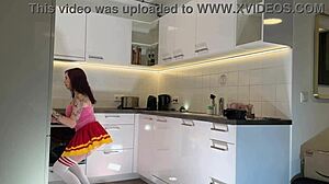 Hottest Tattooed Redhead Cheerleader Flashes See-Through Panties In Kitchen