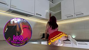 Hottest Tattooed Redhead Cheerleader Flashes See-Through Panties In Kitchen