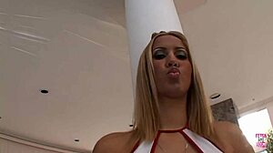 Hey, watch this blonde nurse shove dildo deep in her friend's tight pussy