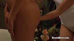sensual lesbian madame indulges in erotic massage bliss with bound submissive slave