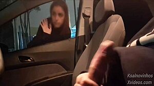 giving this hot teen risky handjob in public street car