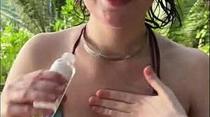 that horny bikini teen oils up for beach titjob and deep suck