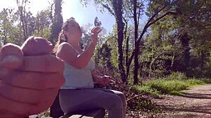 exhibitionist babe seduces curvy milf for outdoor suck fuck facial in park